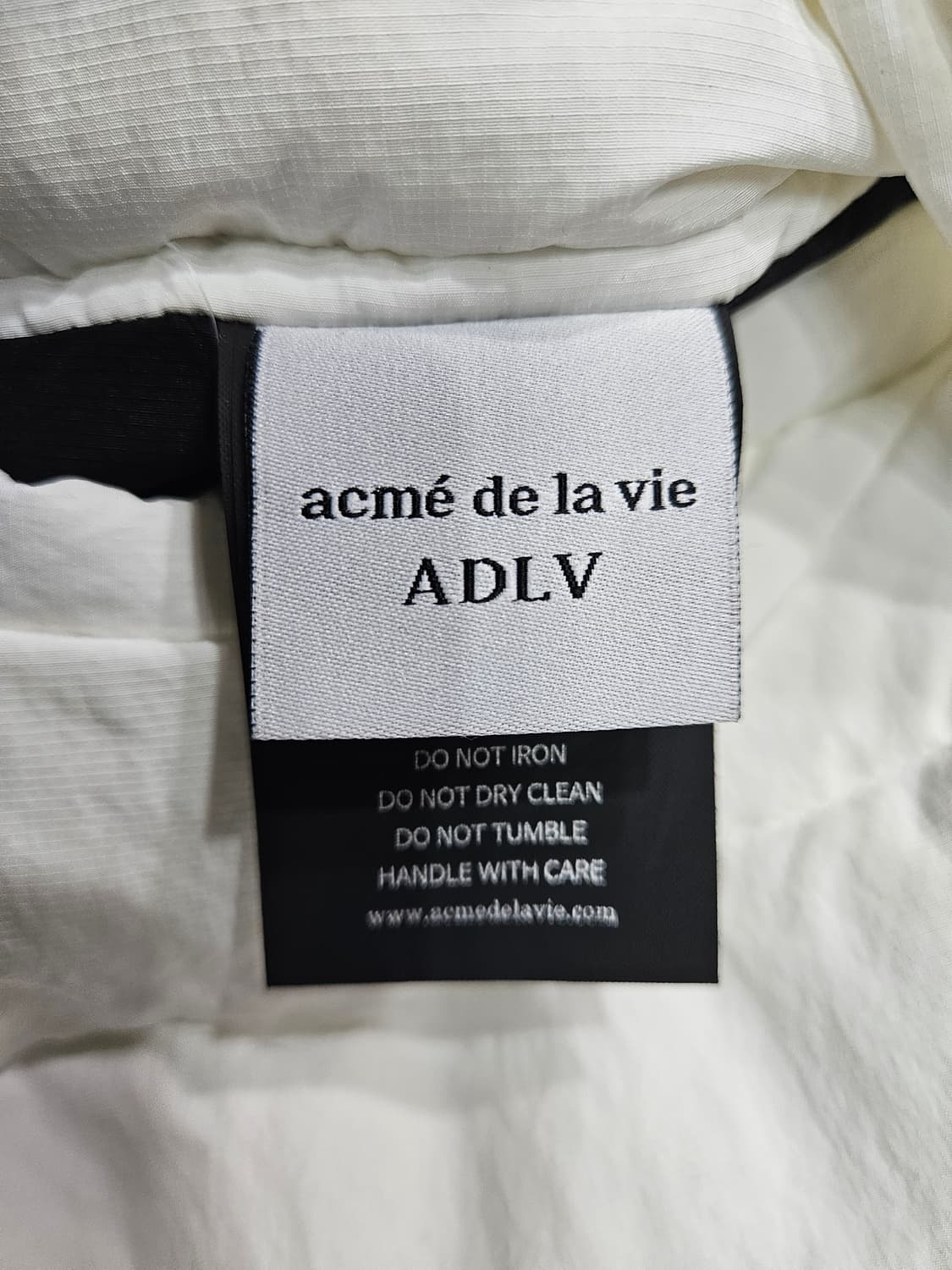 아크메드라비 화이트&블루 남성 100~105 리버시블 베스트 패딩  상품이미지5