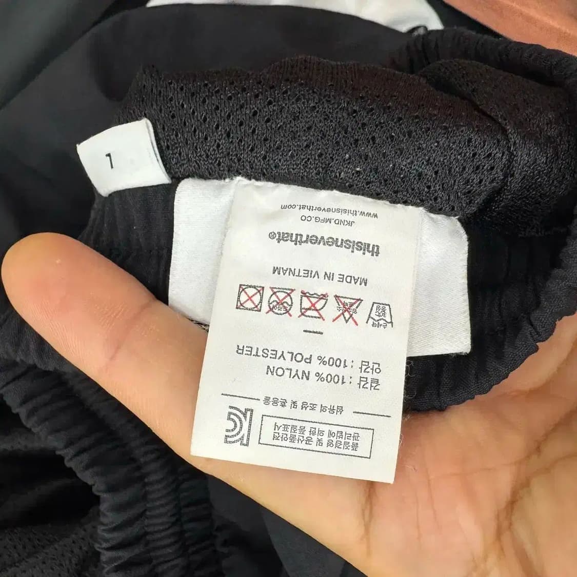 L 디스이즈네버댓 블랙 자수로고 나일론 팬츠  상품이미지6