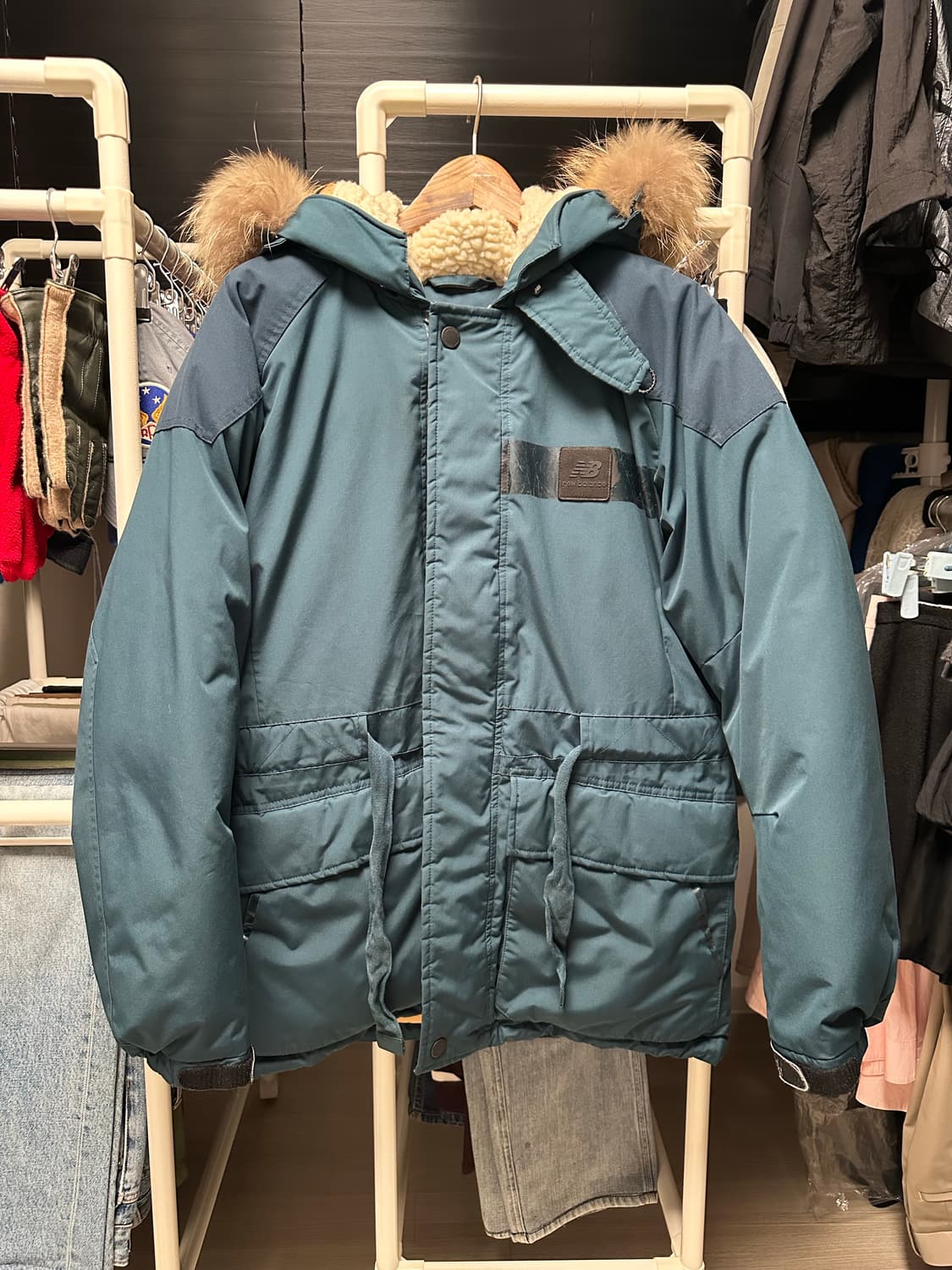 뉴발란스 카메라맨 패딩 네이비 100/L 상품이미지1