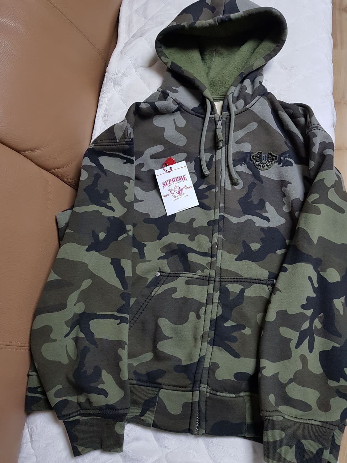 슈프림 X 트루릴리전 후드 집업 티셔츠 브라운 카모 25FW 상품이미지1