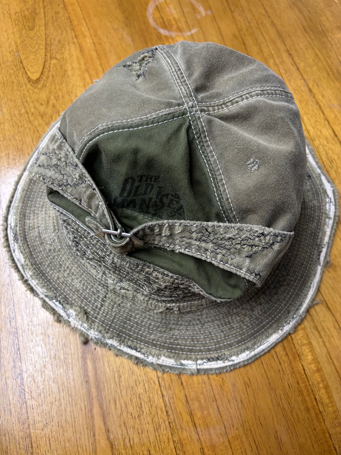 캐피탈 노인과바다 카키 상품이미지1