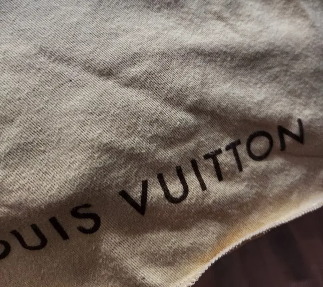 루이비통 에피 에삐 몽테뉴클러치 아이보리화이트 상품이미지5