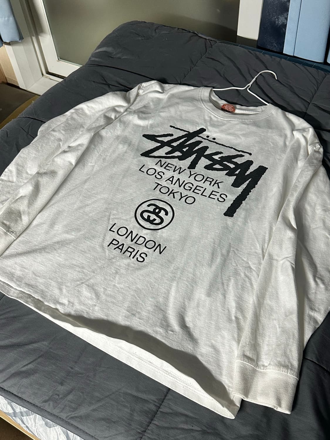 스투시 월드투어 롱슬리브 티셔츠 화이트 상품이미지1