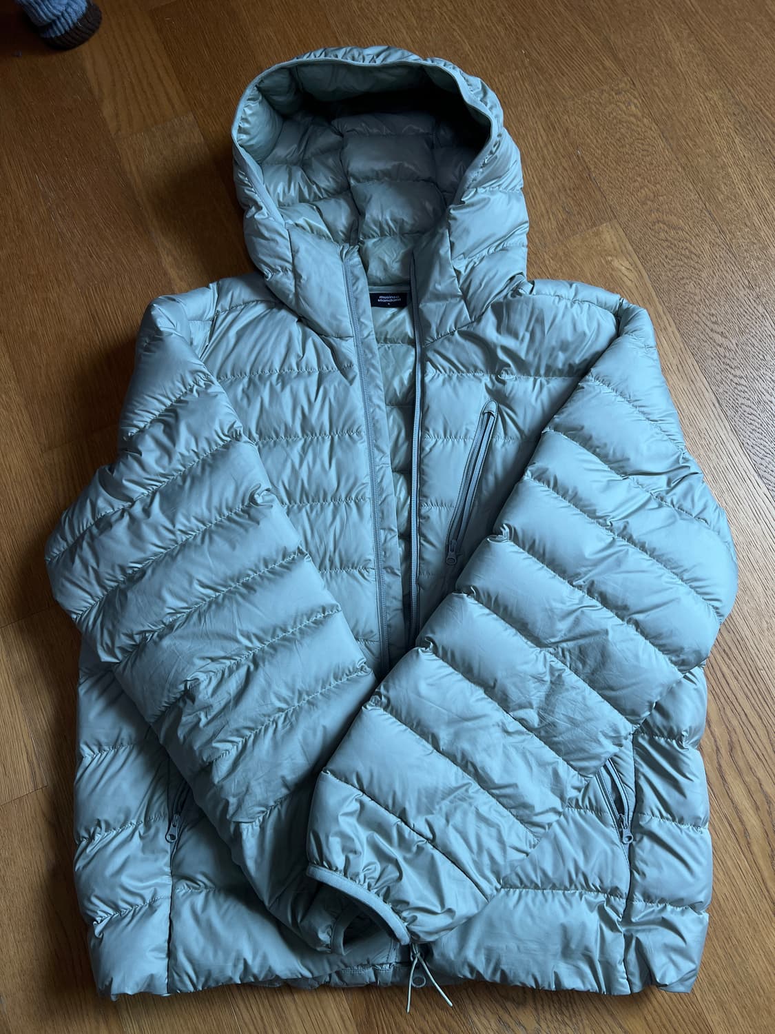 무신사 스탠다드 시티 레저 후디드 라이트 다운 재킷 피스타치오 상품이미지1