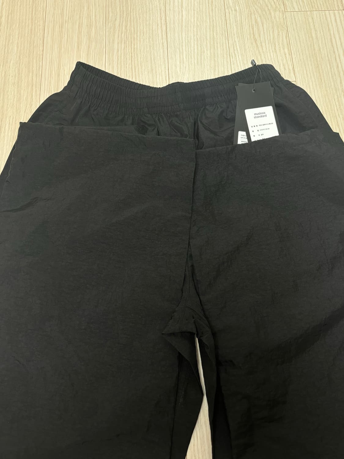 무신사스탠다드우먼 우먼즈 나일론 와이드 스트링 팬츠 [블랙] 24 상품이미지3