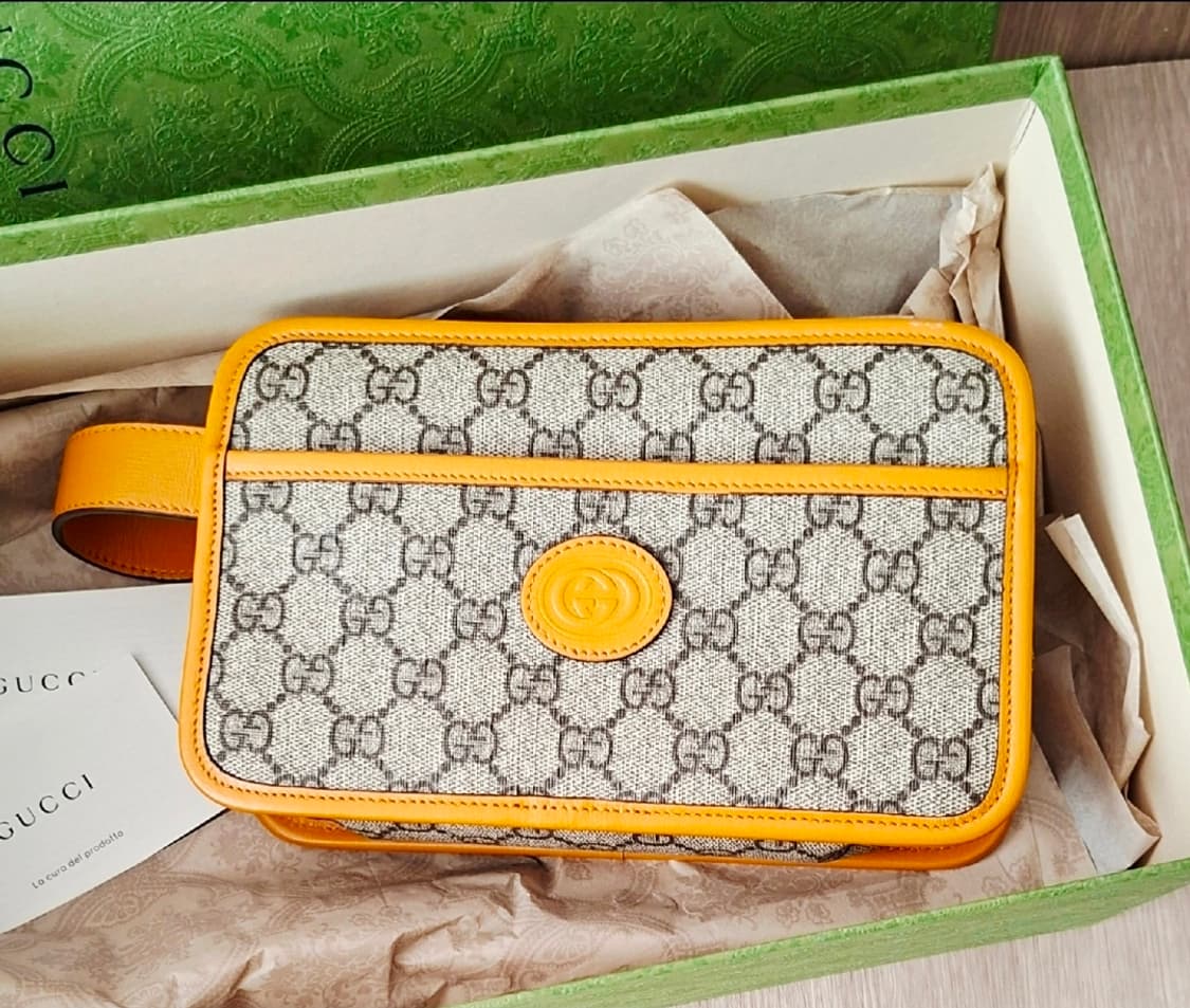구찌 625764 인터로킹GG슈프림 캔버스 파우치백 상품이미지1