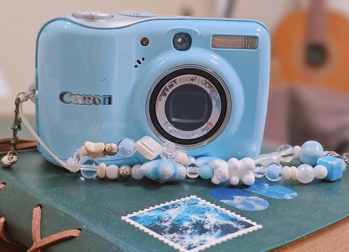 Canon powershot E1 블루 색상 판매합니다!! (작례 첨부) 상품이미지1