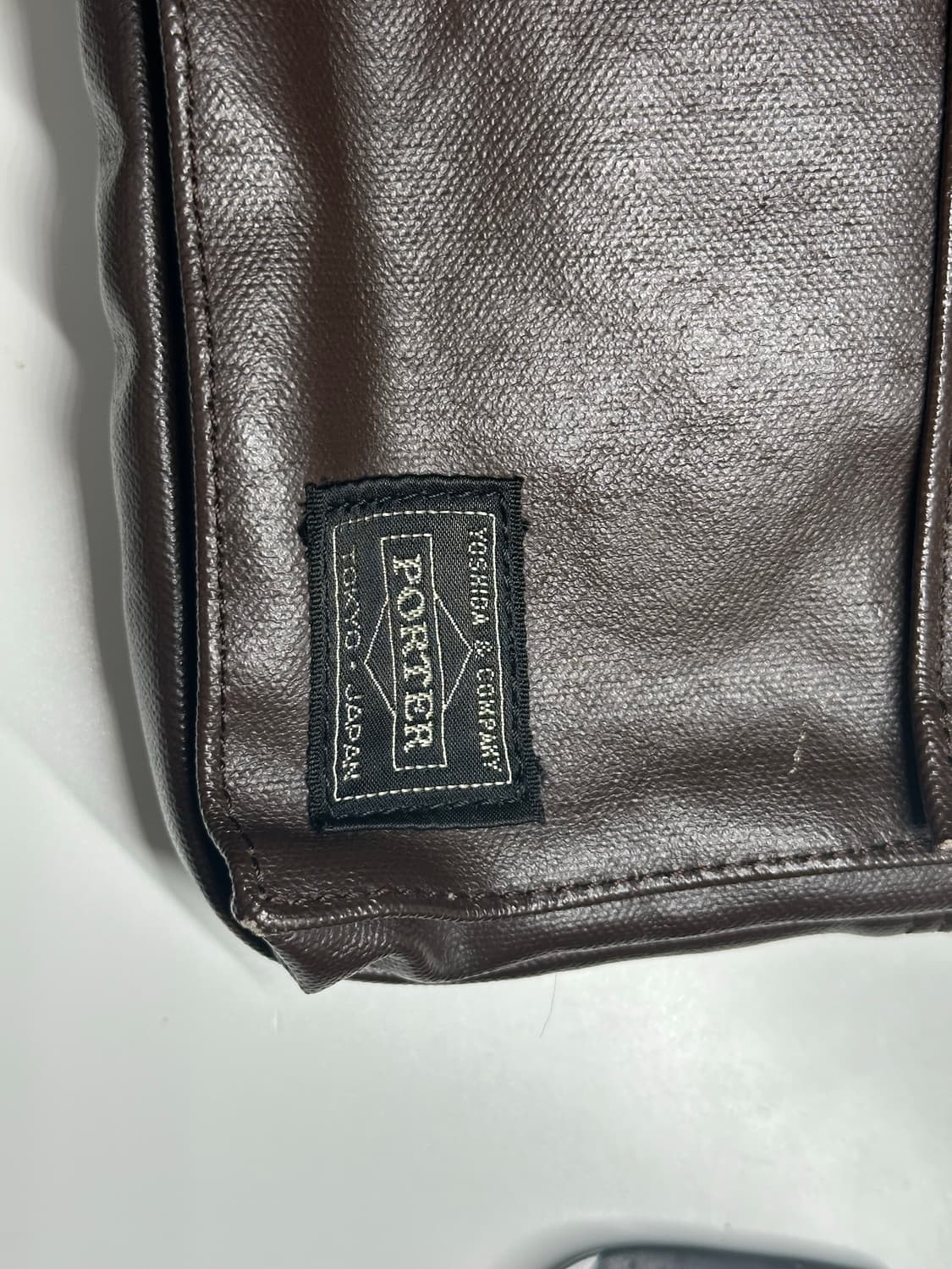 포터 브라운 레더 가방 상품이미지4