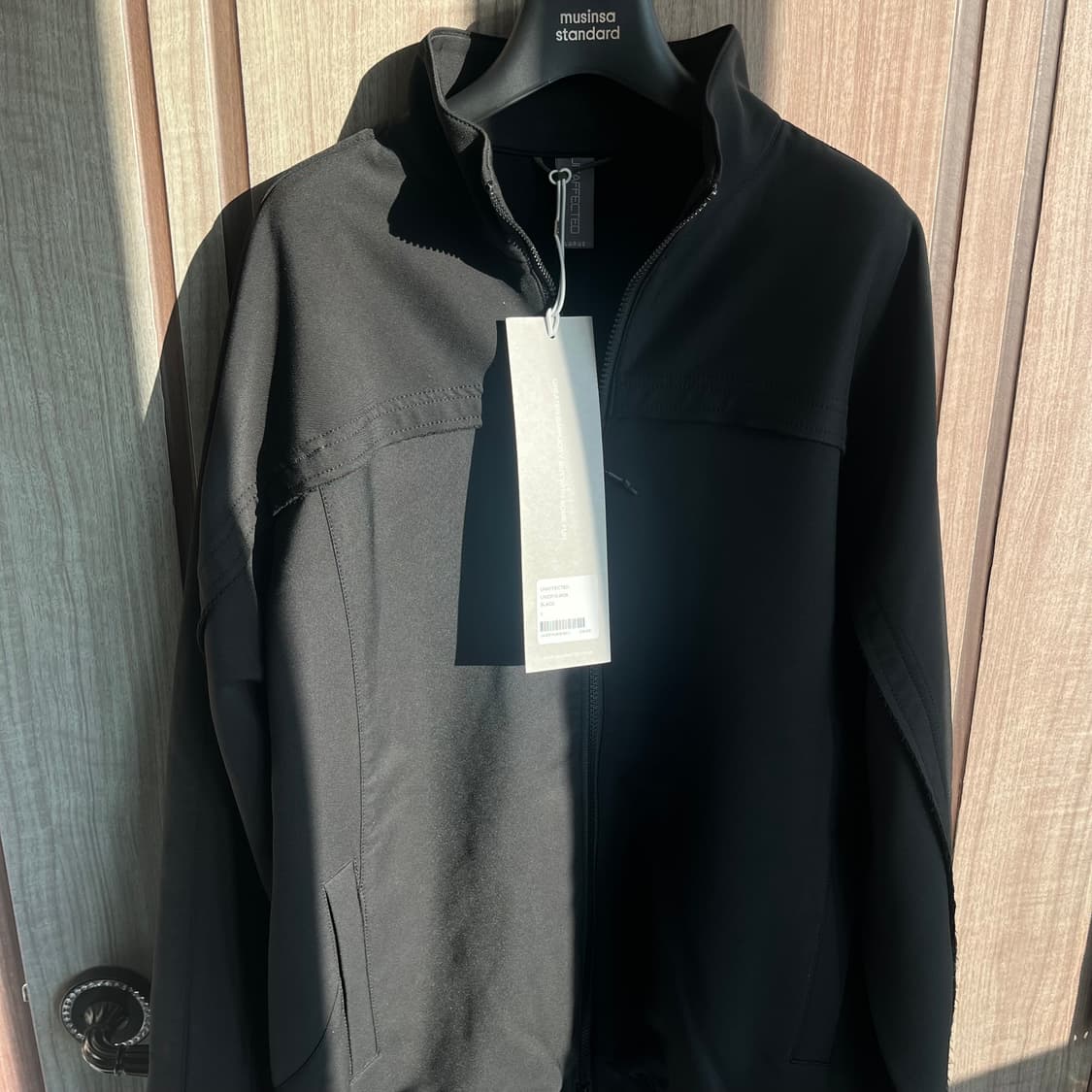 새상품(L)언어펙티드 로우 엣지컷 트랙자켓 블랙 상품이미지1