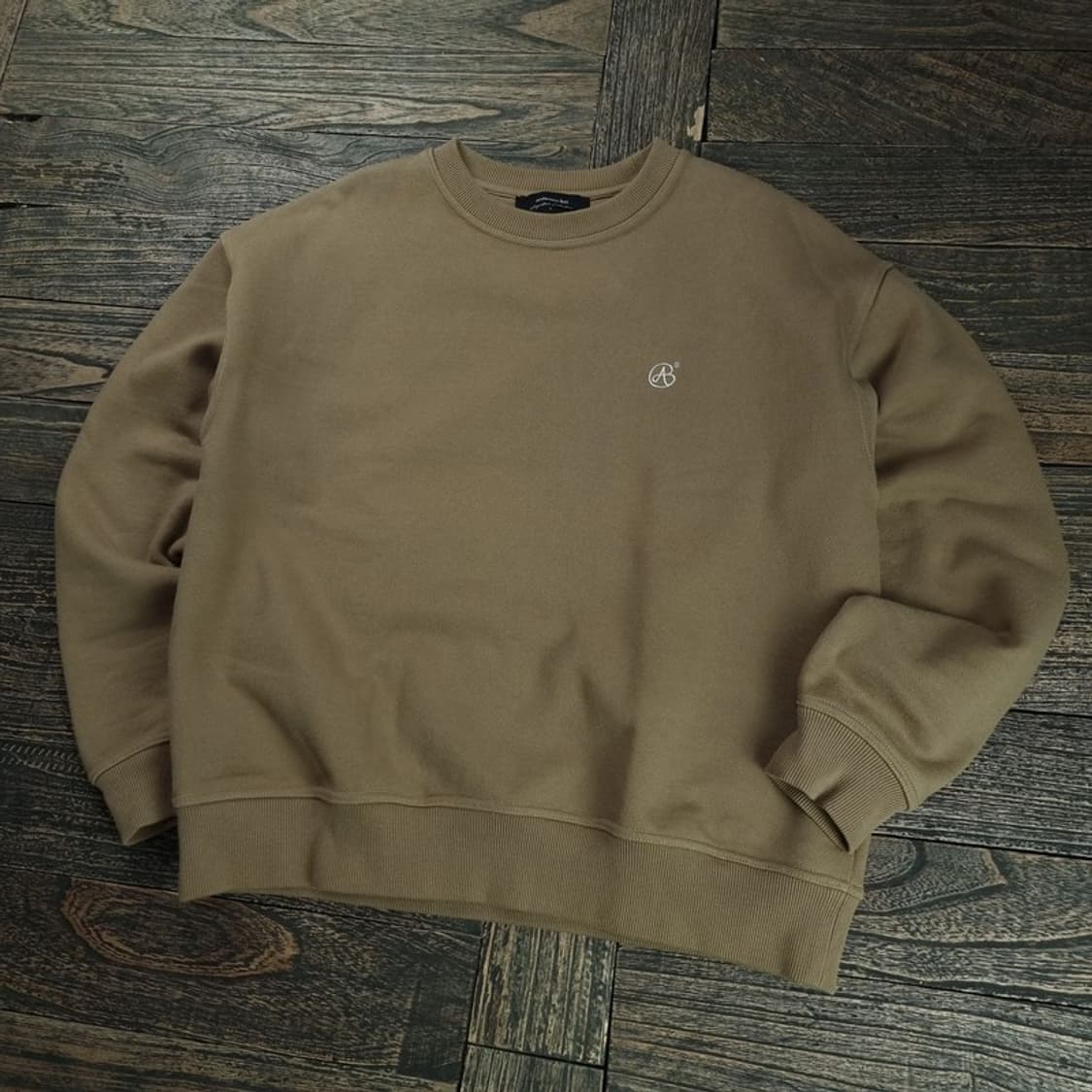 [앤더슨벨] 로고 자수 오버핏 맨투맨 M18879 상품이미지1