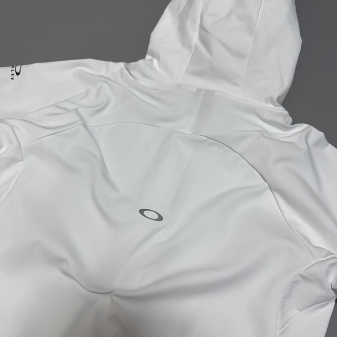 오클리(OAKLEY) 화이트 인핸스 그리드 폴리에스터 후드 윈드브레이커 상품이미지6