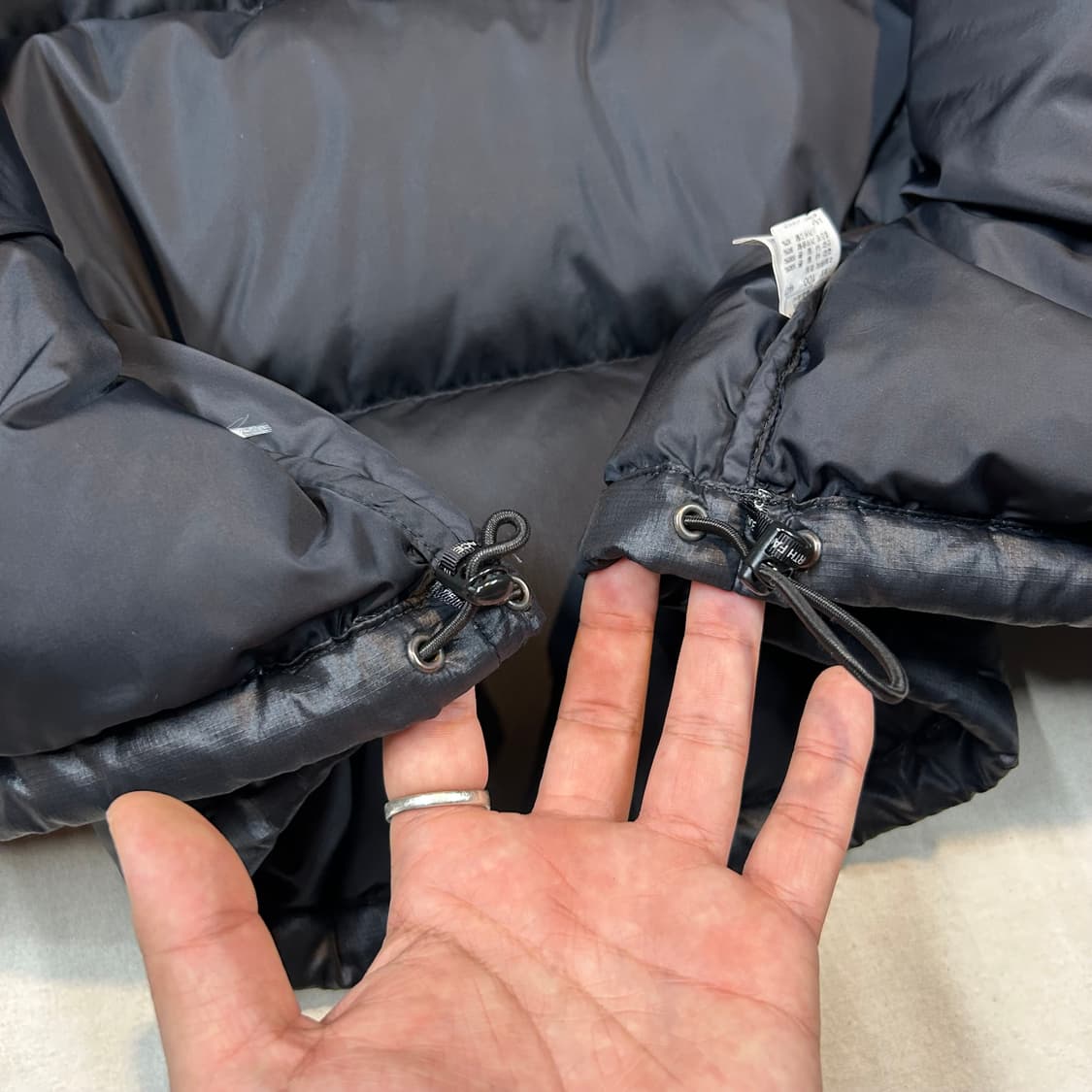 L) 노스페이스 구스다운 눕시 700 블랙 패딩 세탁완료 상품이미지9