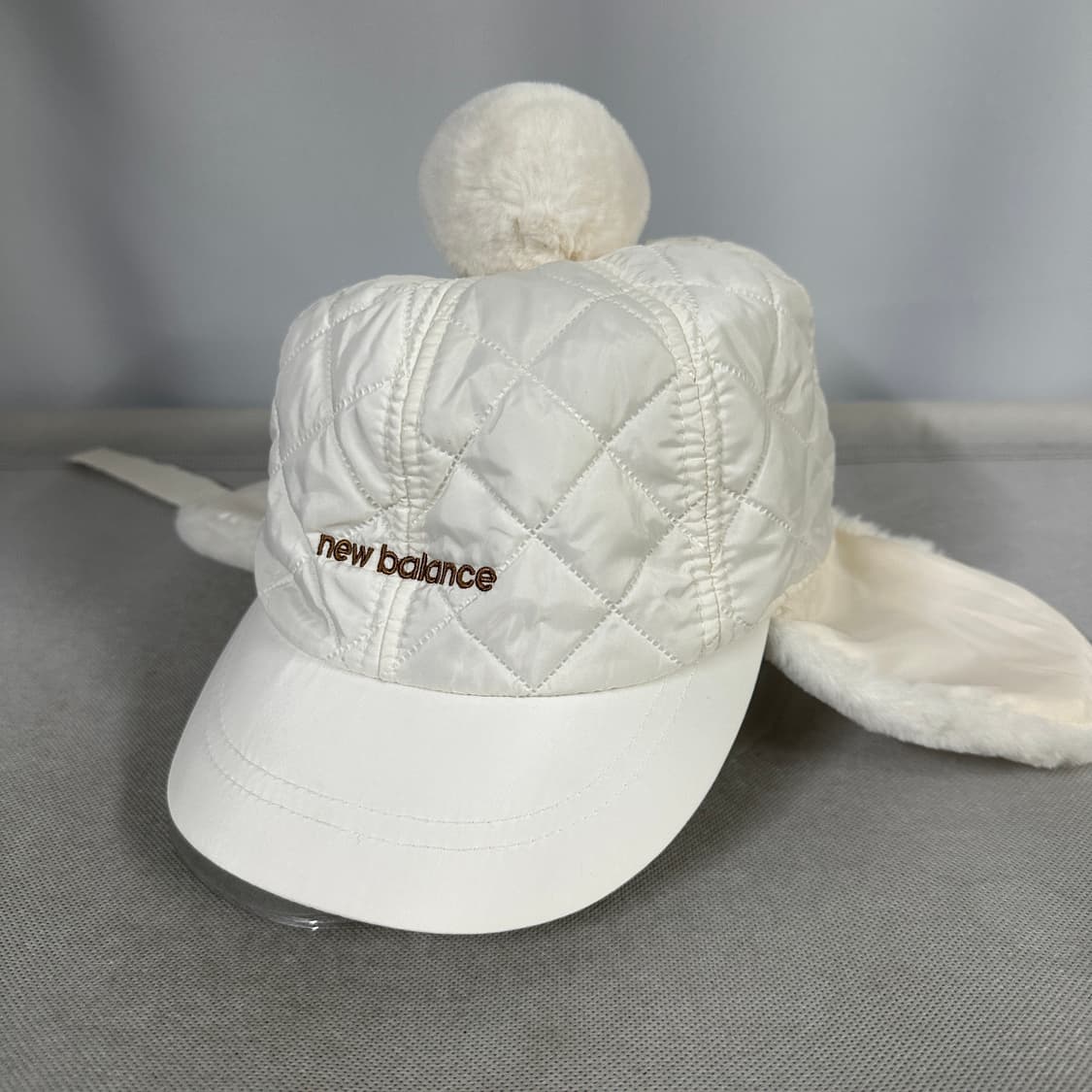 뉴발란스 키즈 퀼팅 폼폼 방한 모자 (56) 상품이미지1