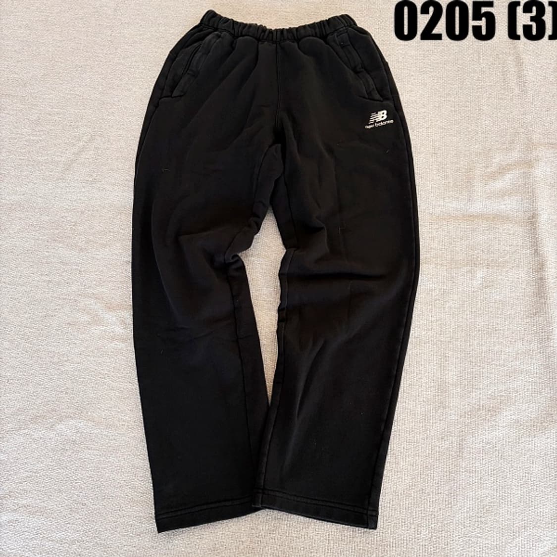 [80M] 뉴발란스 여성 블랙 주머니지퍼 트레이닝 팬츠 0205(3) 상품이미지1