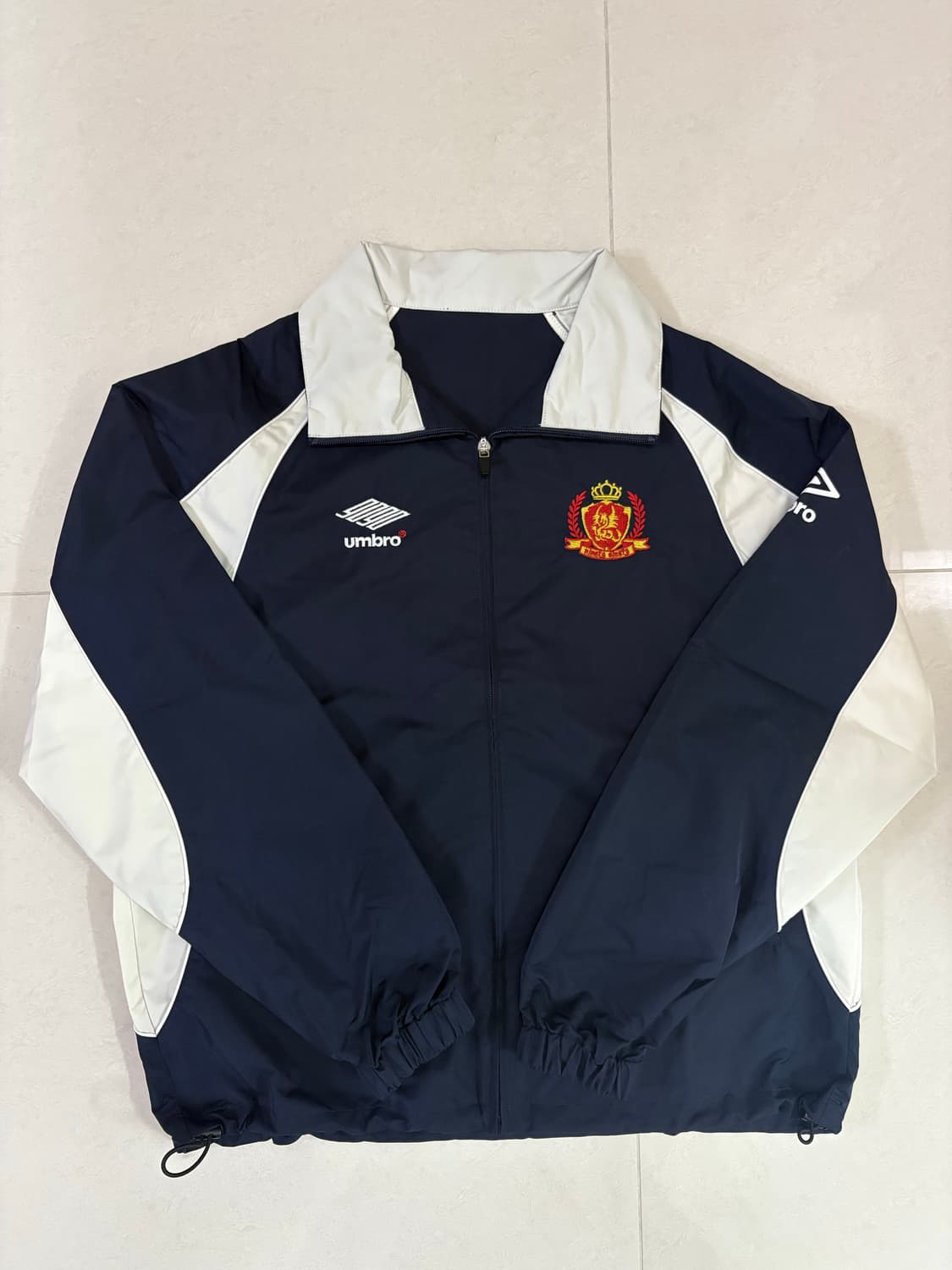 엄브로 X 9090 콜라보 바람막이 로스 네이비 L 상품이미지1