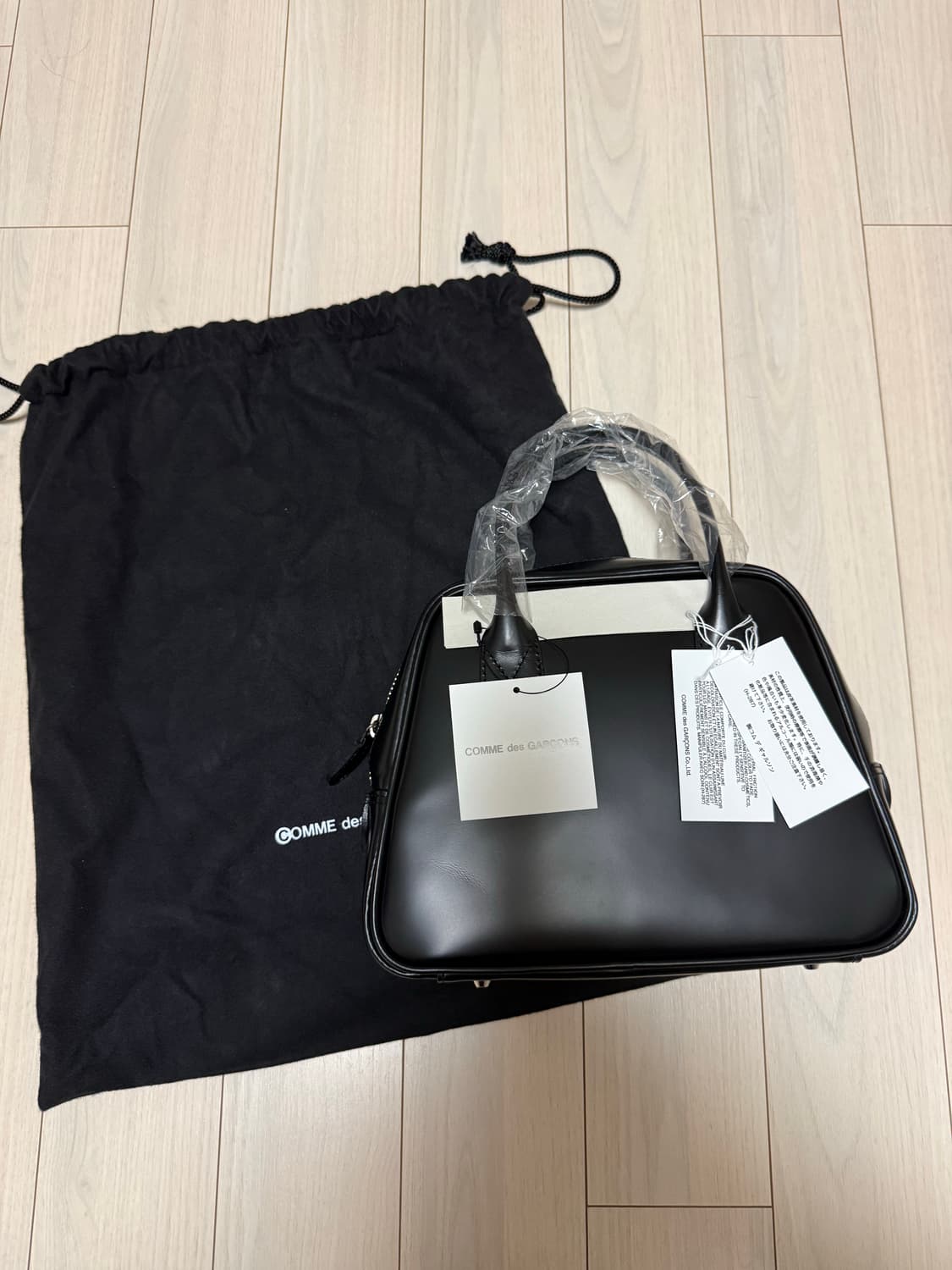 (새상품) 꼼데가르송 아오야마 라운드 2호 상품이미지1