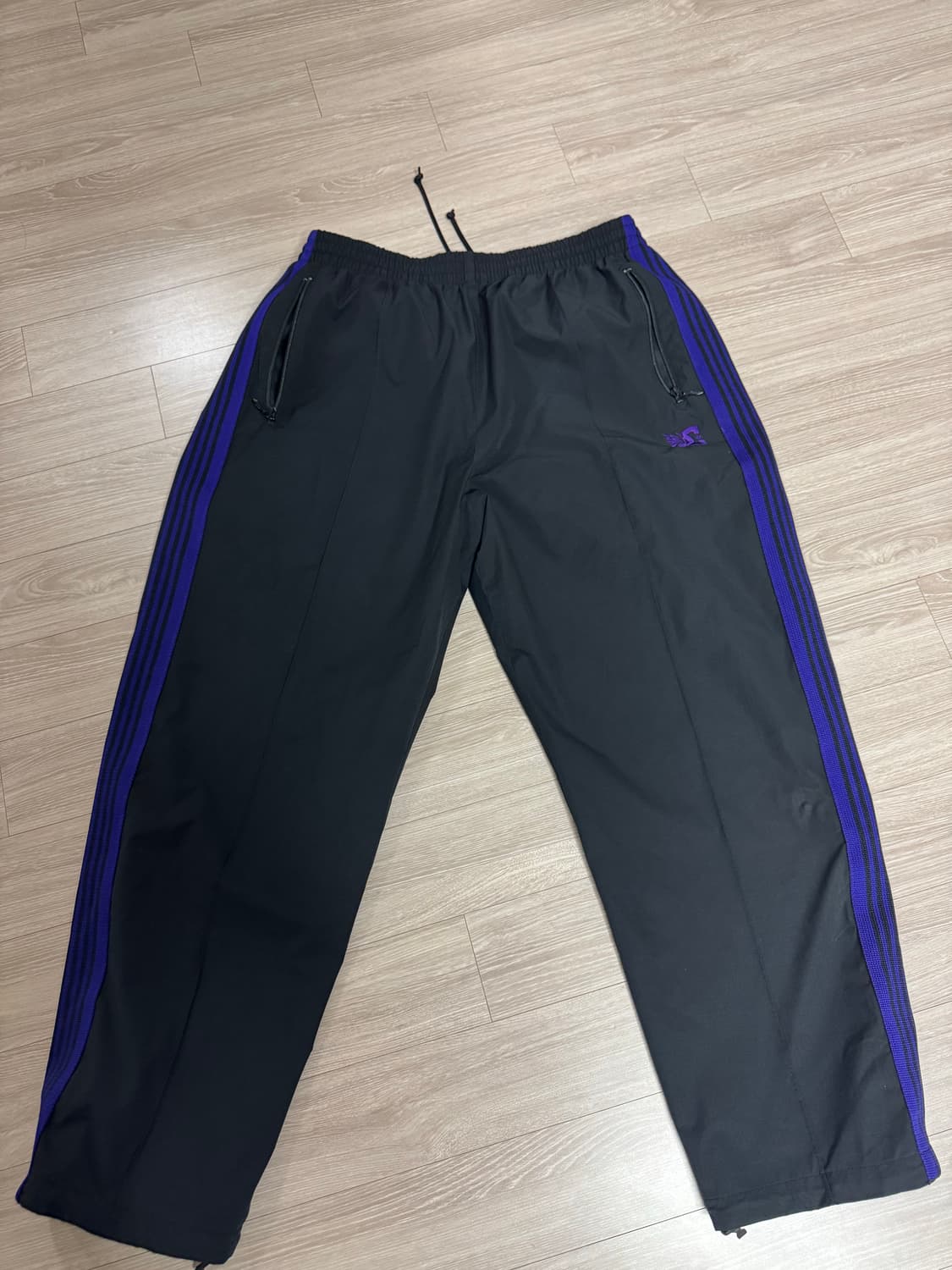 니들스 dc 콜라보 트랙팬츠 상품이미지1