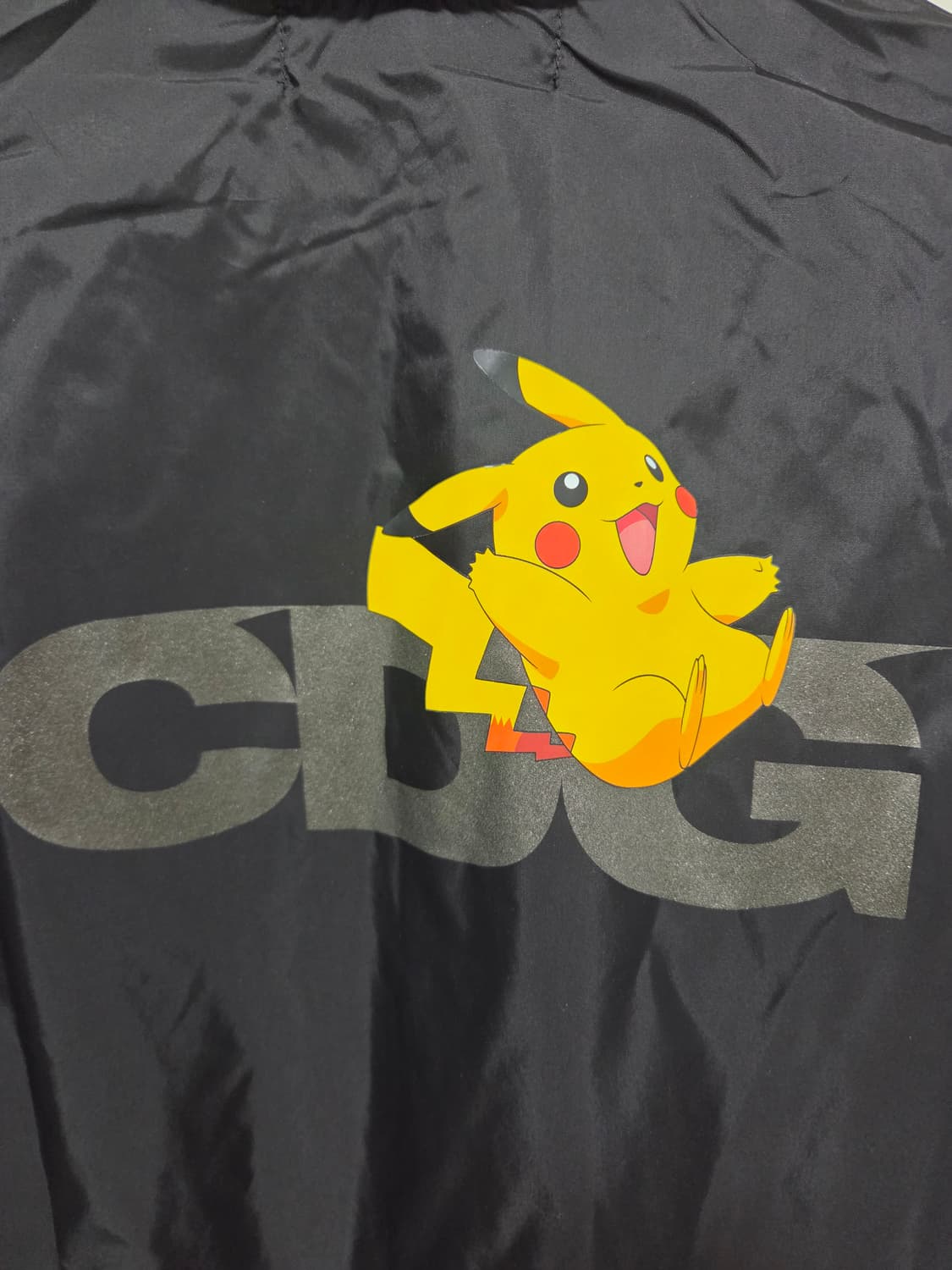 [새상품] cdg x 포켓몬 콜라보 코치자켓 상품이미지1