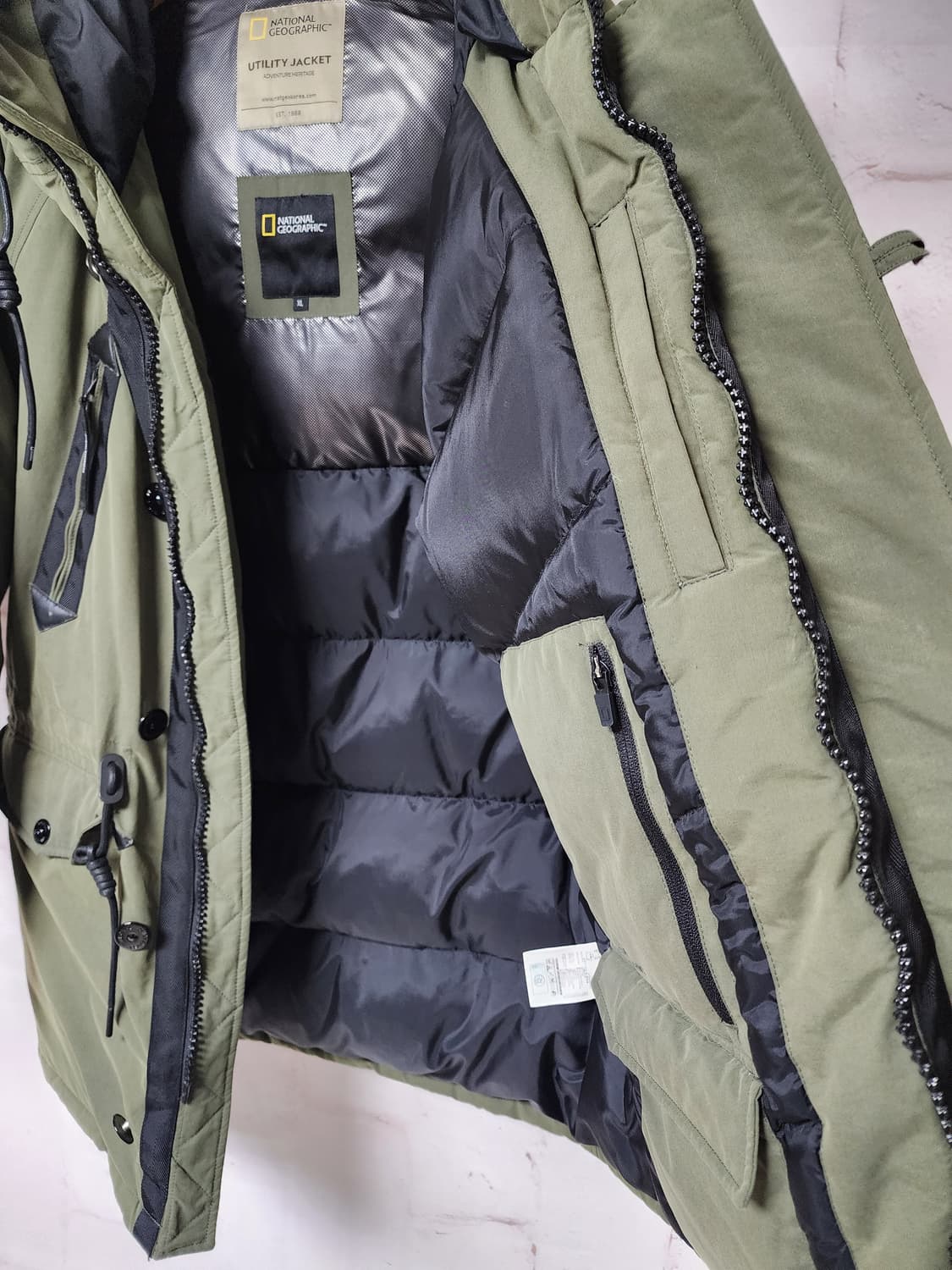 내셔널지오그래픽 
카키색 패딩 야상 점퍼 상품이미지10