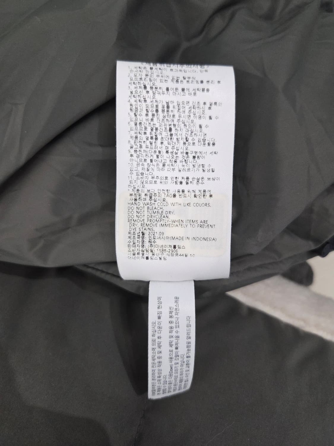 내셔널지오그래픽 뽀글이 덕다운 숏패딩 카키 상품이미지9