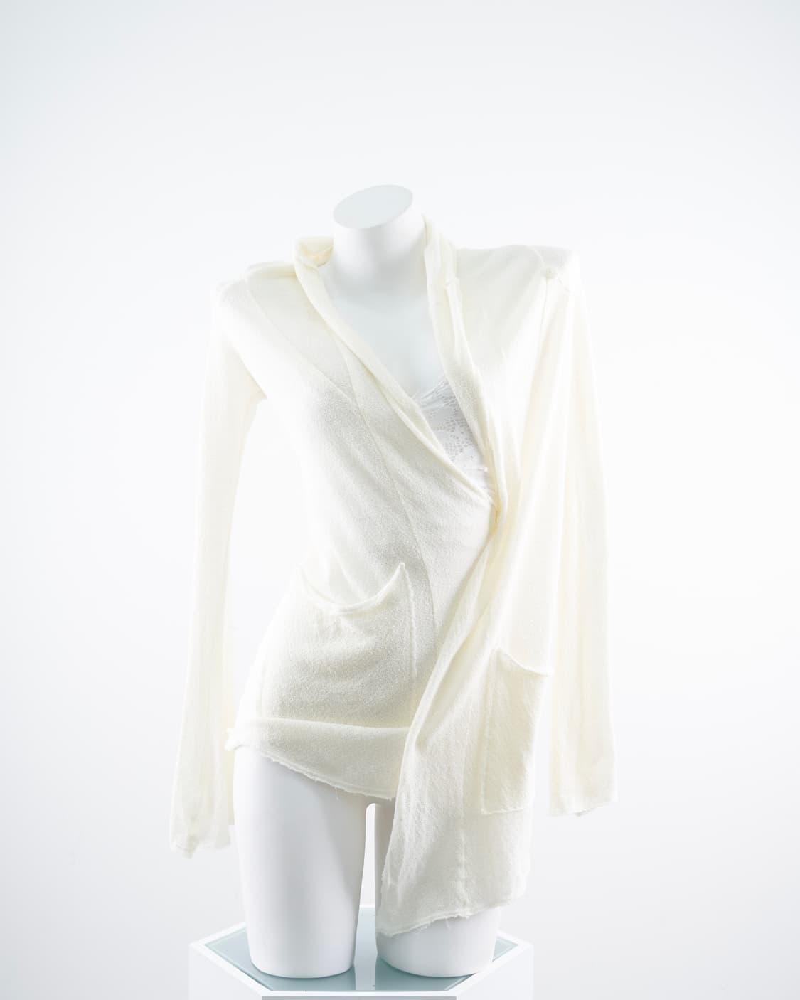 G.O.A 아이보리 언발 디테일 가디건 상품이미지1