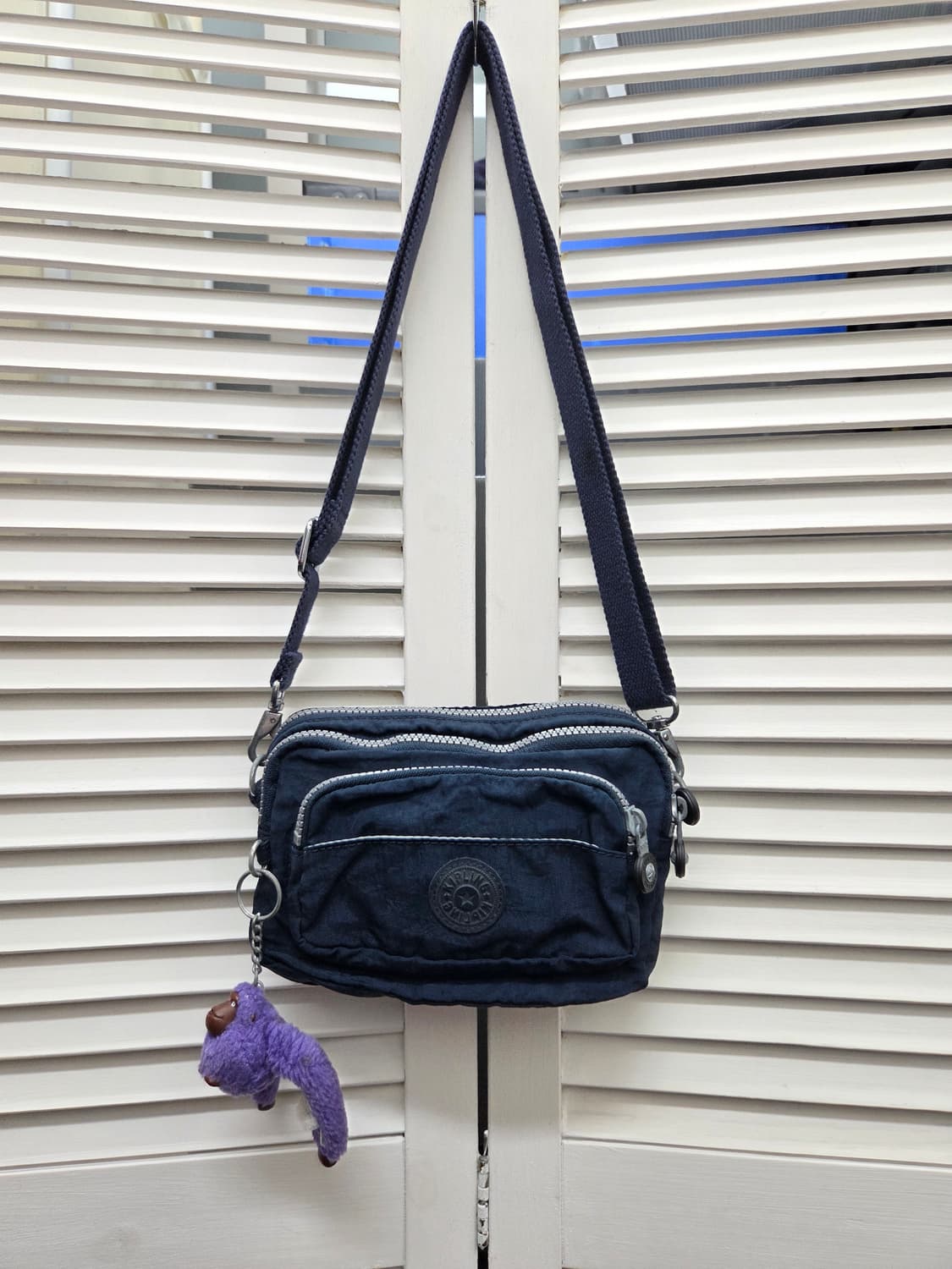 키플링 네이비 미니 크로스백 상품이미지1