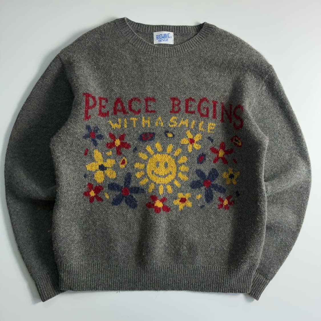 Bigwave  빅웨이브 피스 비긴스 스마일 울 라운드 니트 상품이미지1