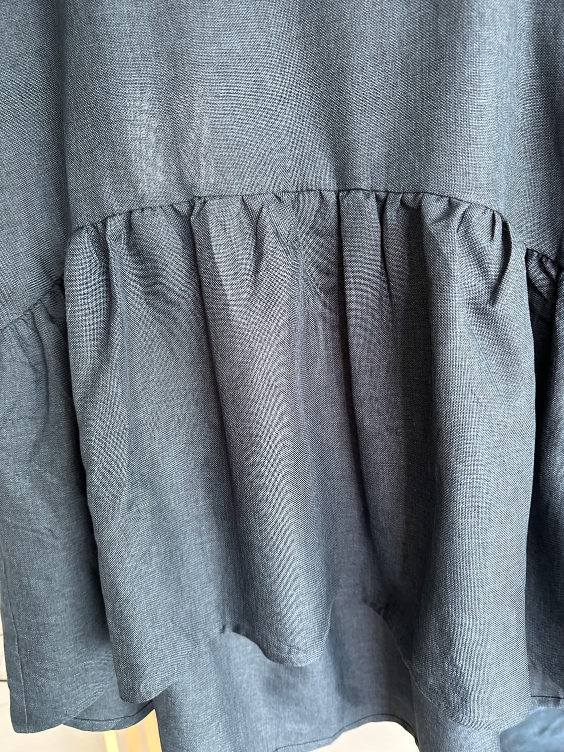 네이비색 언발란스 민소매 블라우스 상품이미지5