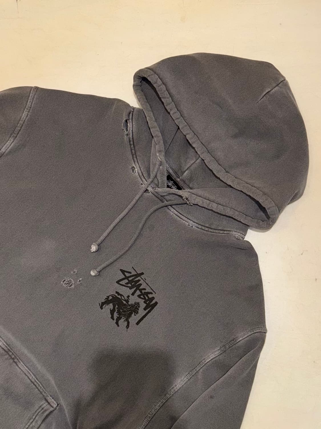 스투시 라스타 라이언 피그먼트 다이드 데미지 후드티 상품이미지1