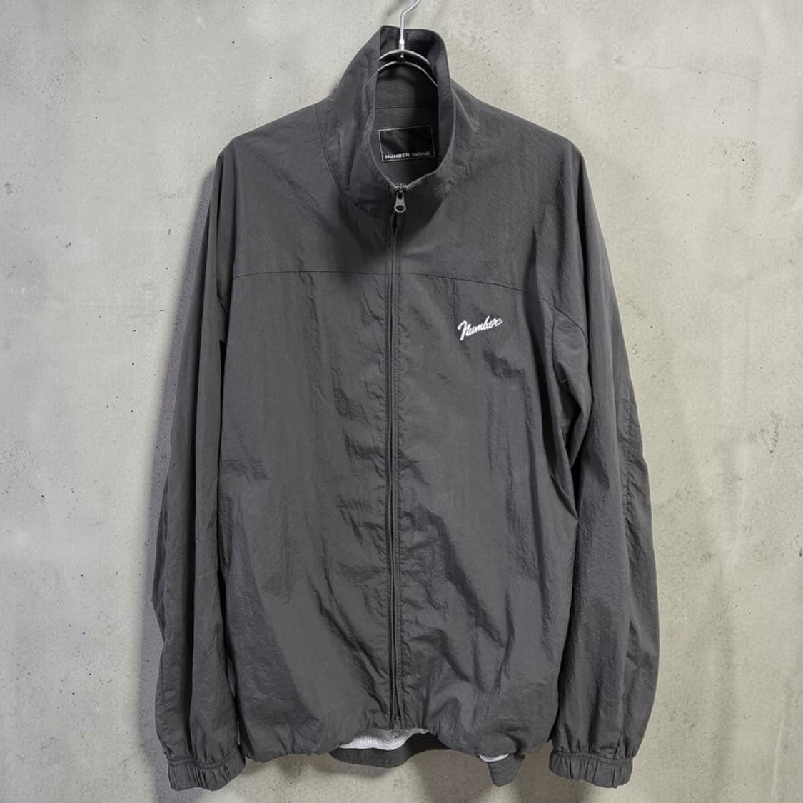 넘버나인 레터링 나일론 트랙자켓 상품이미지1