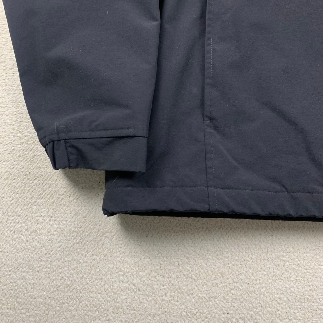 칼하트 WIP 님버스 풀오버 아노락 자켓 블랙 상품이미지4