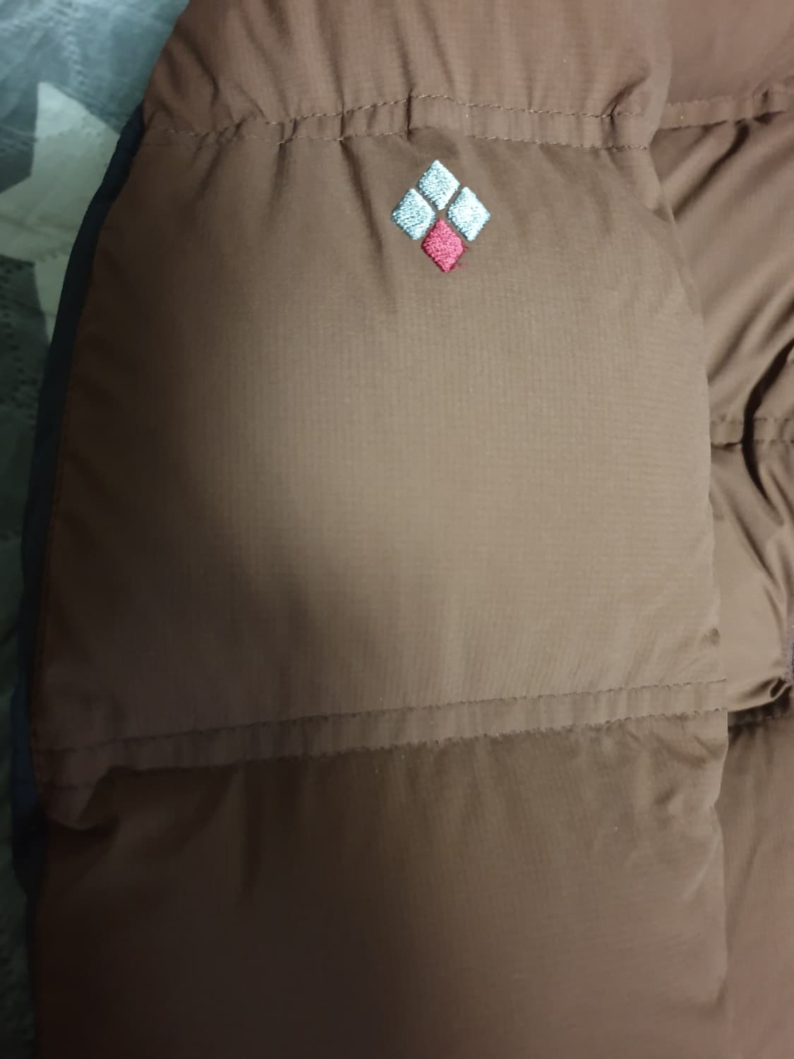 몽벨 폭스퍼 구스다운 윈드스토퍼 필800 패딩 브라운 (100) 상품이미지4