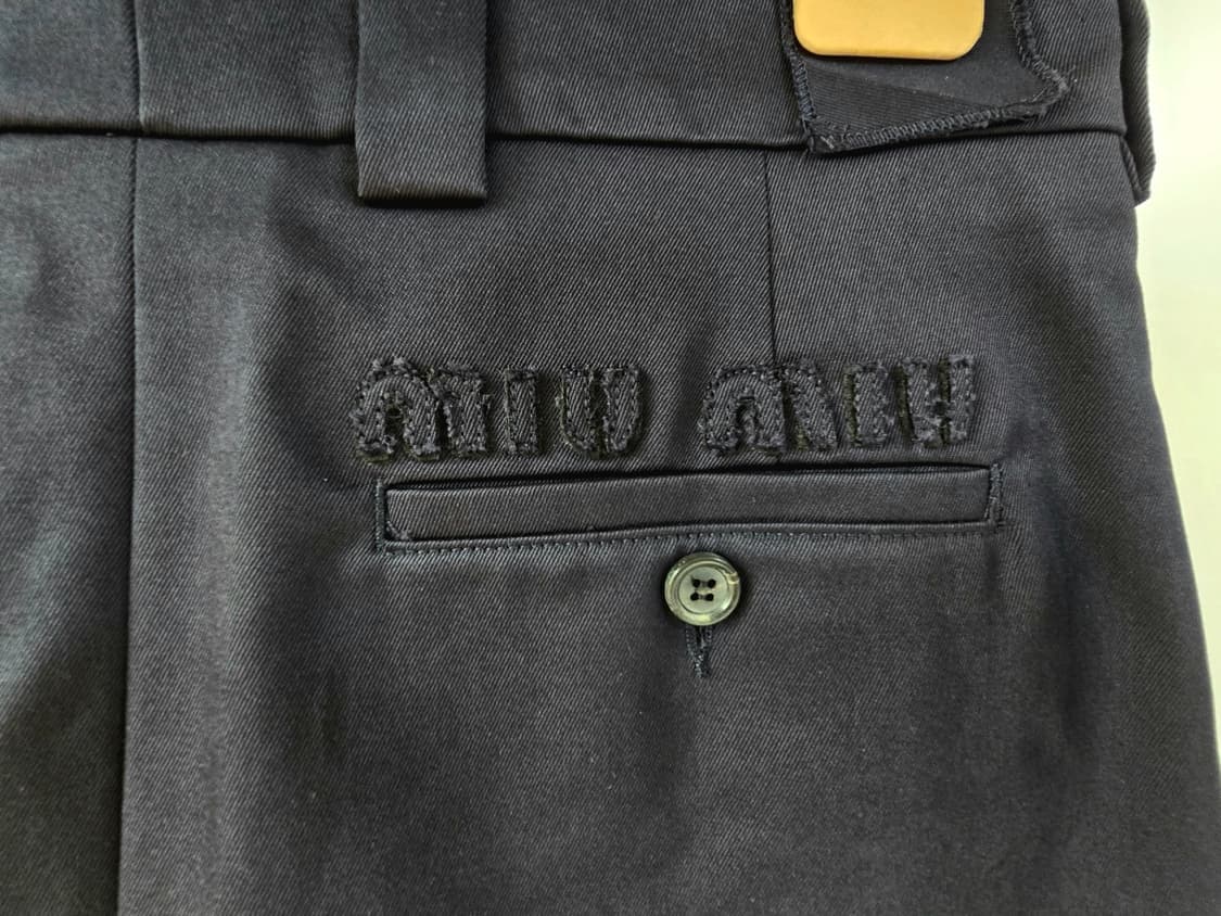 새제품] 미우미우 플리츠 로우라이즈 미니 스커트 22SS 상품이미지3