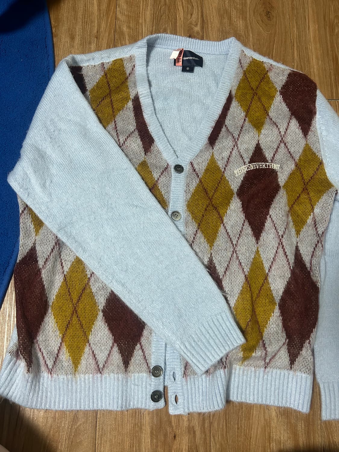 디스이즈네버댓 아가일 니트 가디건 상품이미지1