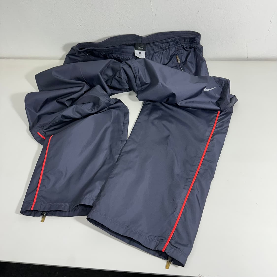 우먼M-L 나이키 다크네이비 레귤러핏 바람막이 팬츠 상품이미지2