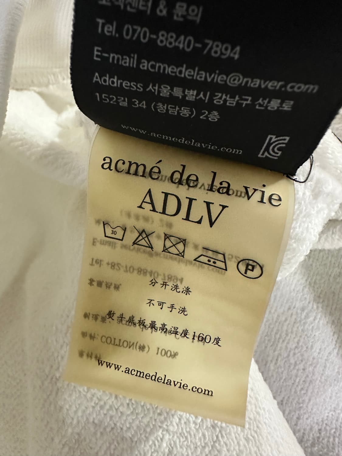 아크메드라비 흰색 도넛 후드티 상품이미지5