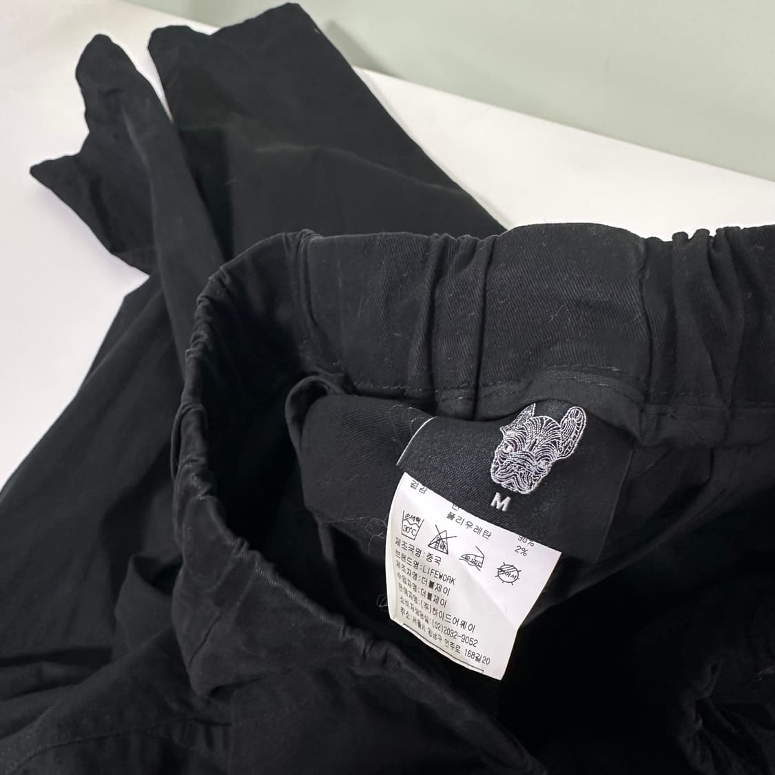 M 라이프워크 블랙 슬림핏 벨티드 팬츠 상품이미지6