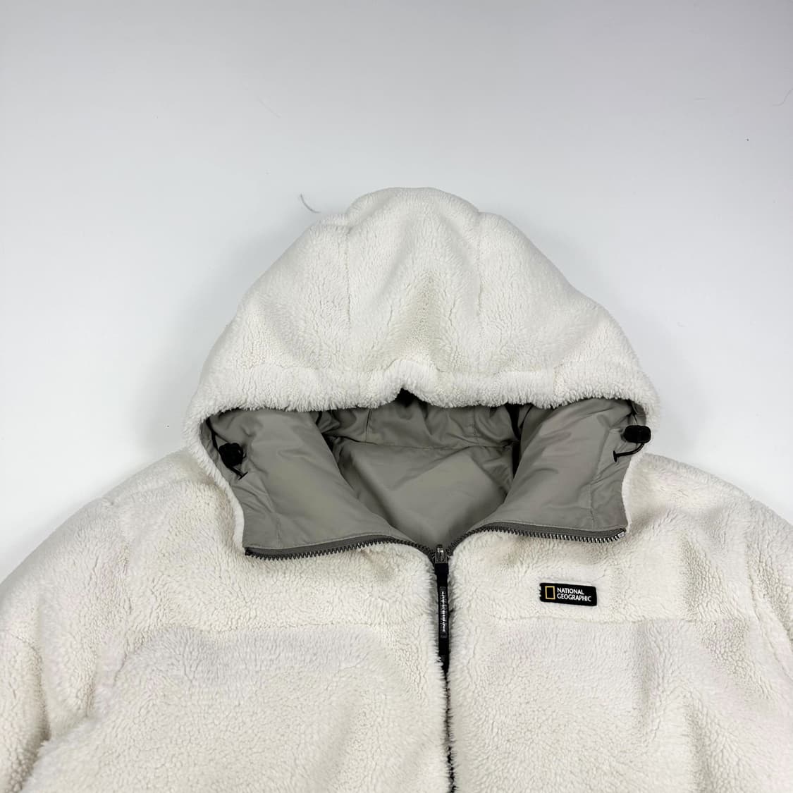 내셔널지오그래픽 뽀글이 와펜 리버시블 패딩 M 상품이미지2