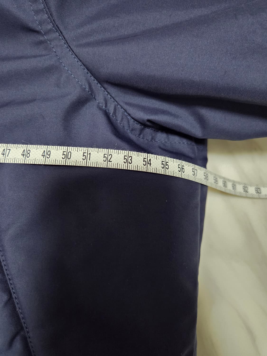 오니츠카타이거 네입 다운 패딩 상품이미지7