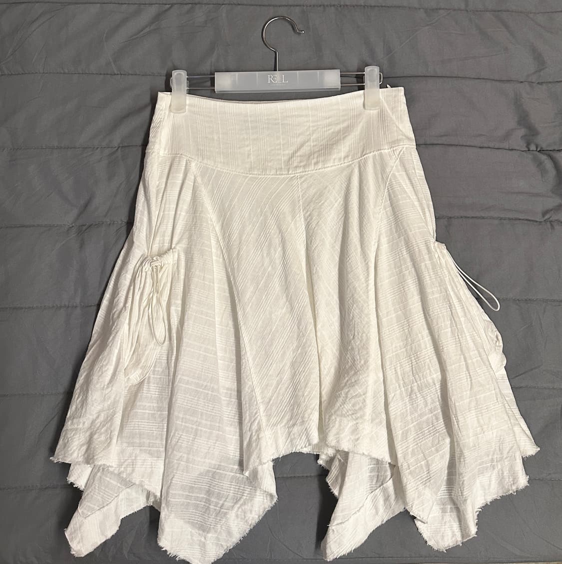 라라폭스 언밸런스 플레어 스트링 포켓 스커트 아이보리 치마 미디스커트 상품이미지2