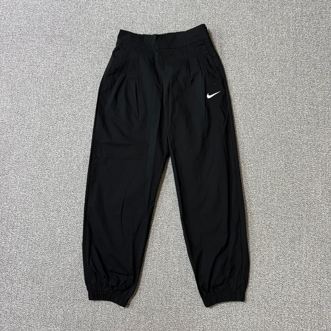 나이키 우븐 바람막이 조거팬츠 여성용 상품이미지1