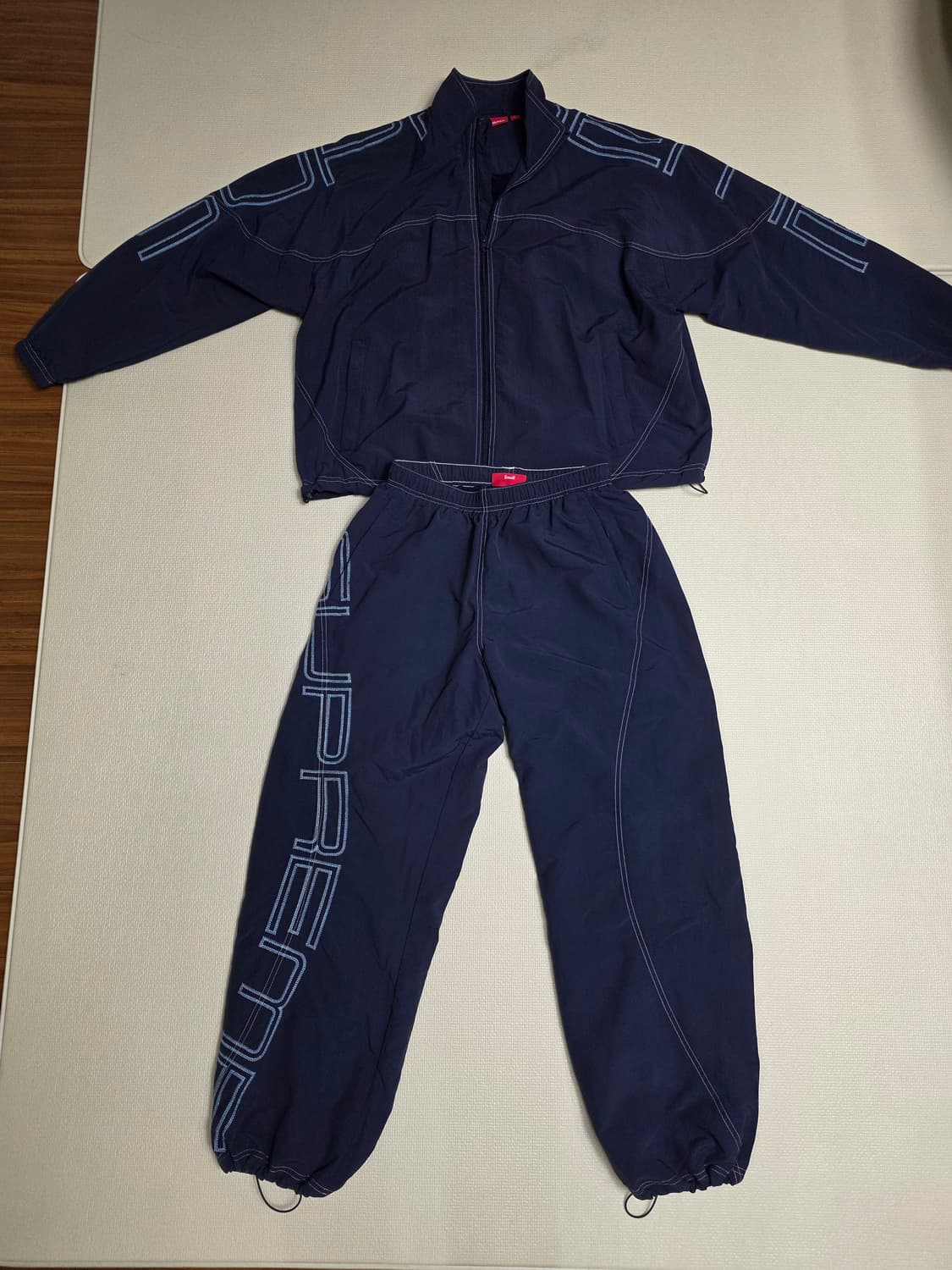 [S] 슈프림 스펠아웃 트랙 셋업(자켓+팬츠) 네이비 상품이미지1