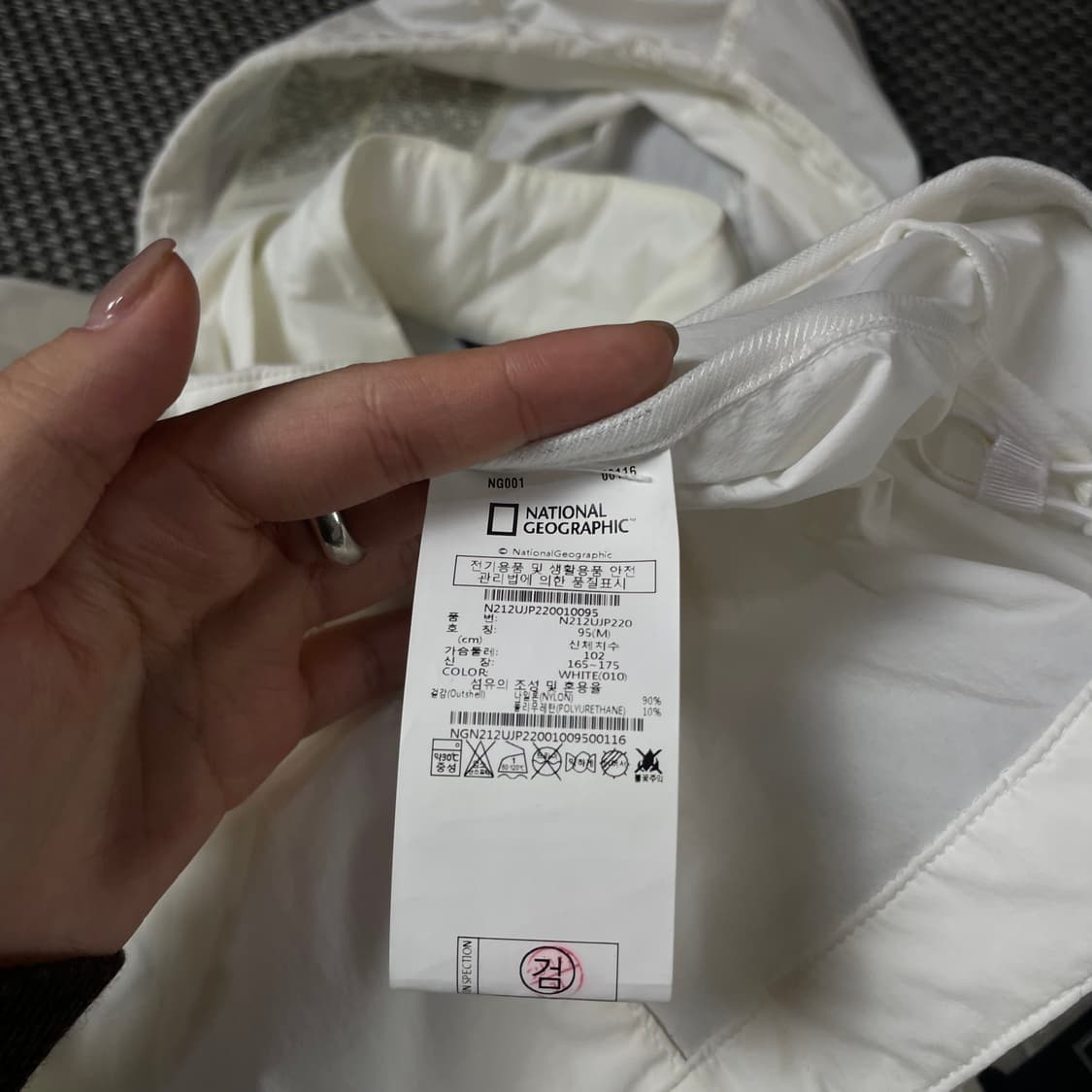 내셔널지오그래픽 화이트 바람막이 M 상품이미지8