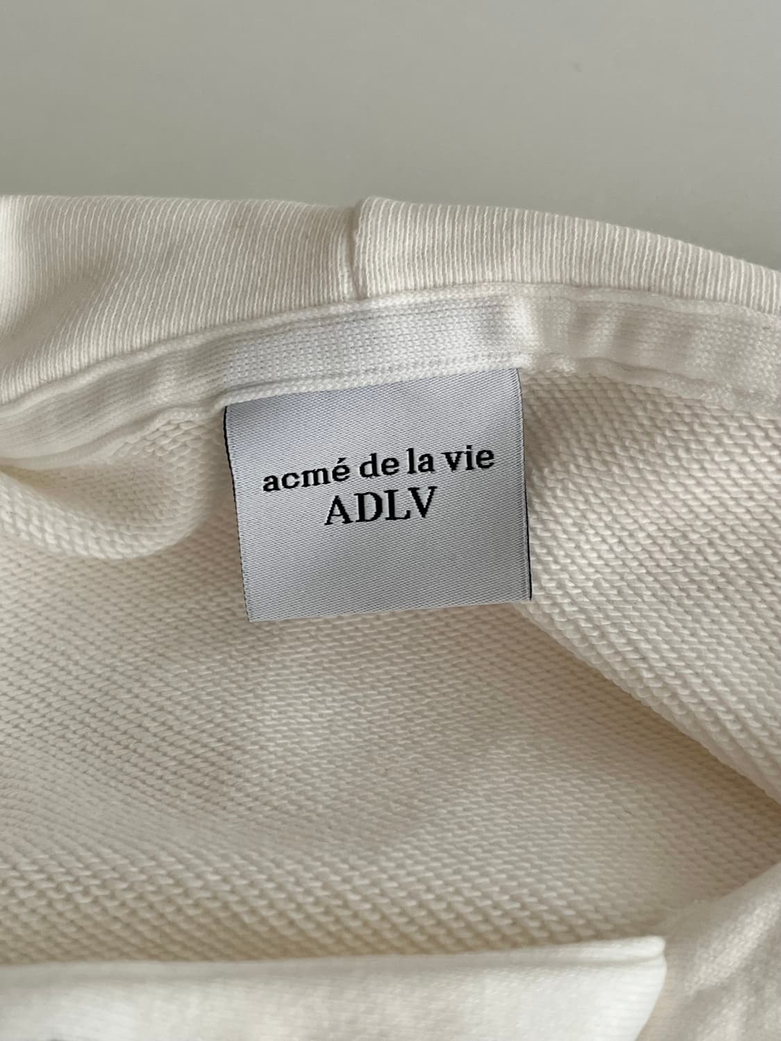 100) 아크메드라비 후드 티셔츠 아이보리 상품이미지4