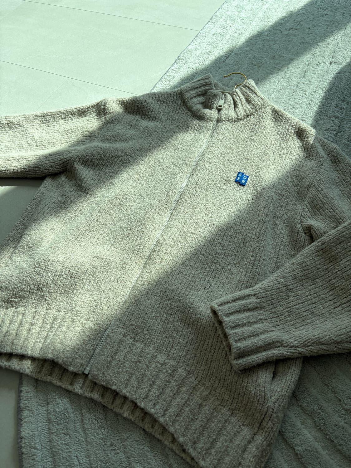 아더에러 니트 집업 오트밀  상품이미지1