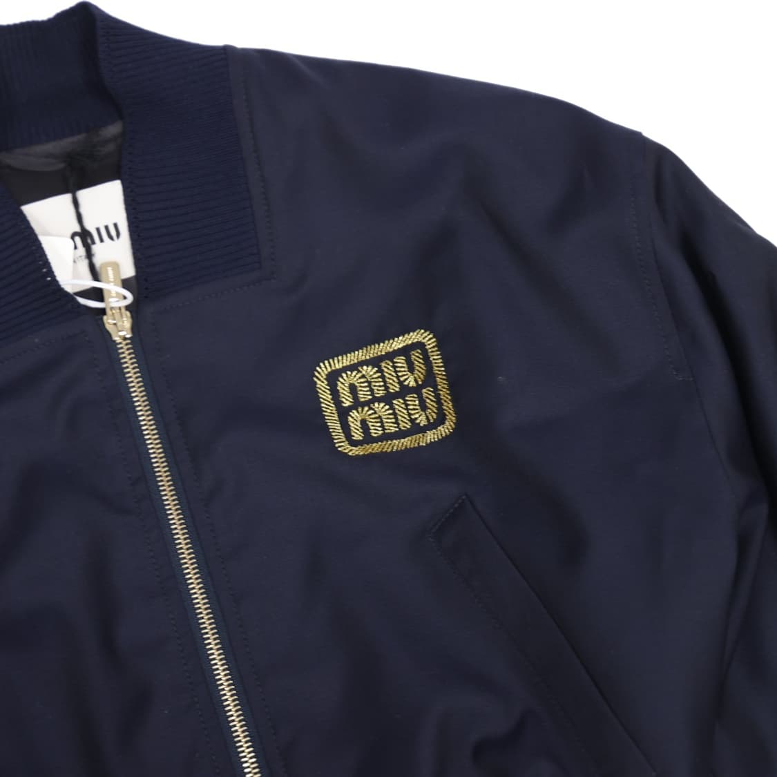 미우미우 ML936 크롭 바타비아 봄버 바시티 자켓 울 네이비 상품이미지4