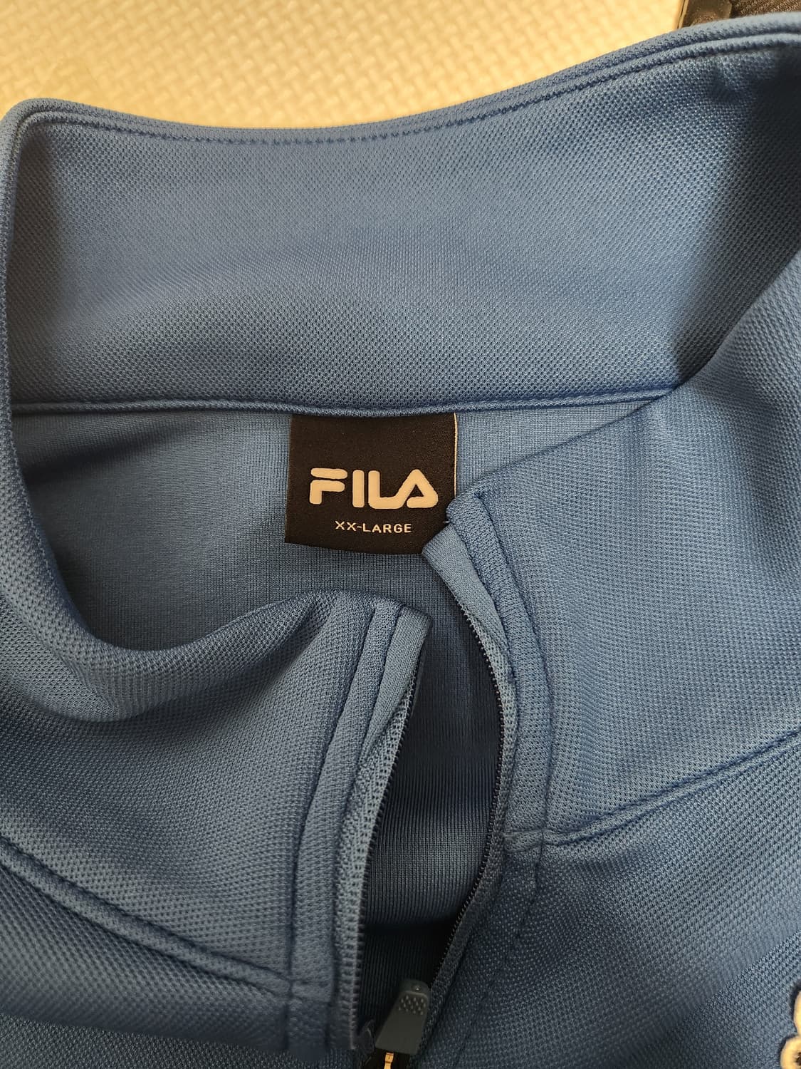 휠라 제주유나이티드. 반집업 티셔츠 사이즈2XL 상품이미지3