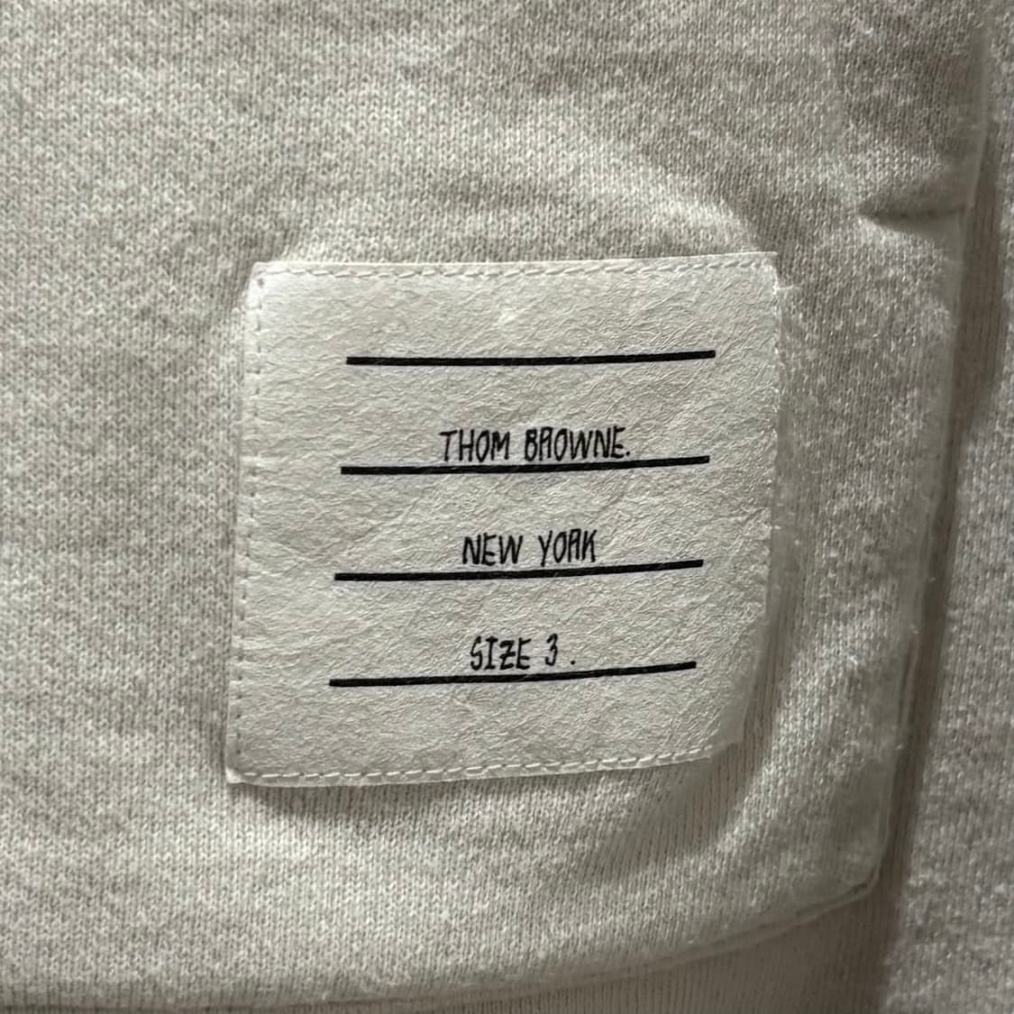 A+ / 3 (100~) 톰브라운 사선완장 하프집업 맨투맨 아이보리 상품이미지4