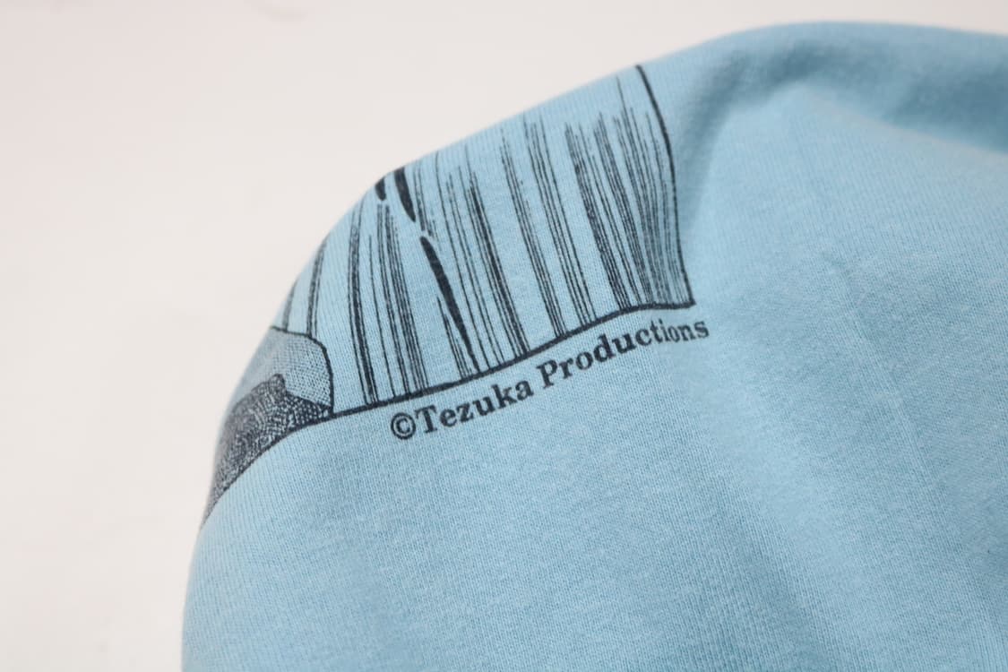 몽벨 x 데즈카 프로덕션 카파 백 프린팅 하늘색 반팔 티셔츠 (L) 상품이미지5