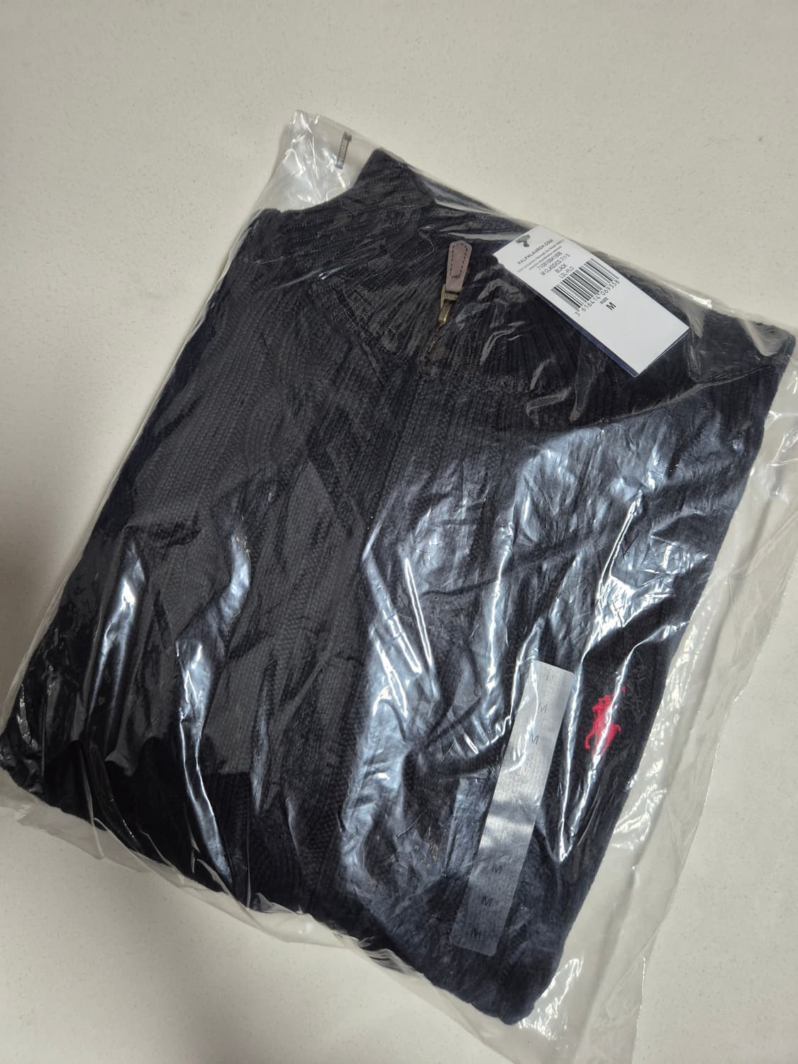 폴로 반집업 니트  상품이미지1